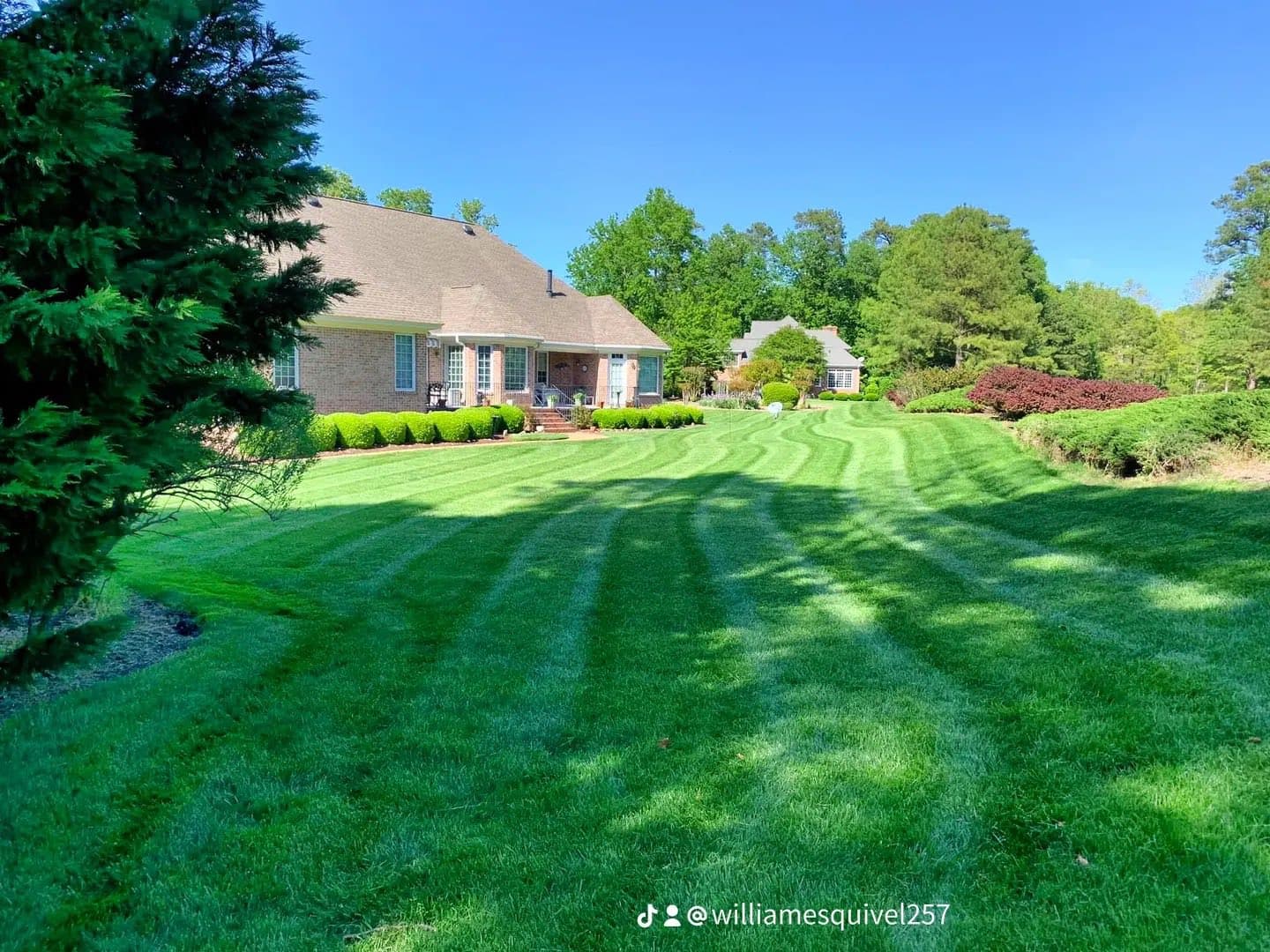 Manicured residential lawn by HQ Landscaping